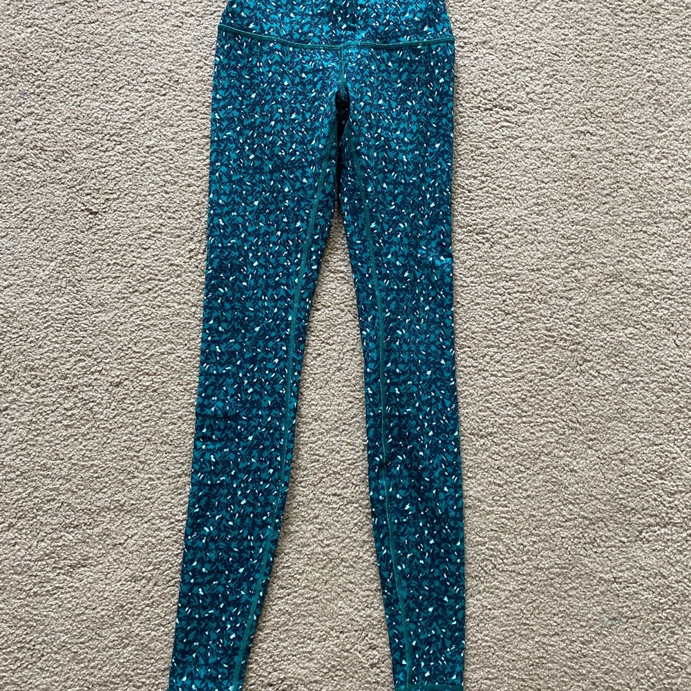 Green Lululemon leggings with print